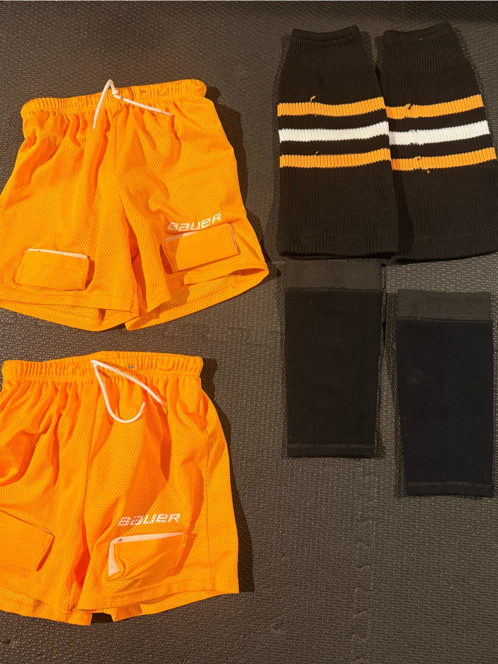 Bauer Kids' Bright Orange Athletic Shorts with Black Accessories size M